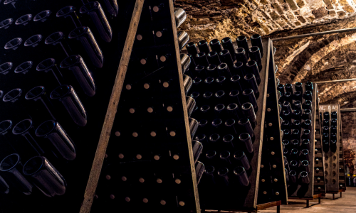 Traditional Champagne cellar in France. This is gyropalette, a rack used for riddling the Champagne during second fermentation.